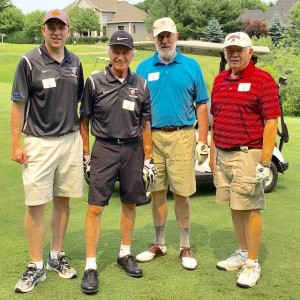 A great day of golf! Keith Stout, Augsburg Regent Curtis Sampson, former Augsburg College President Bill Frame, with Regent Norm Hagfors. Hagfors received a standing ovation at the Clair Strommen A-Club Golf Tournament dinner for his leadership in the Augsburg CSBR Campaign.