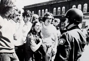 group talking to police officer