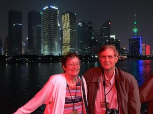 Miriam and Ron Peterson with Shanghai in the background.