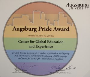 Pride Award for CGEE on rainbow paper