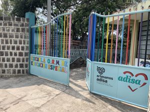 colorful gates open to a school