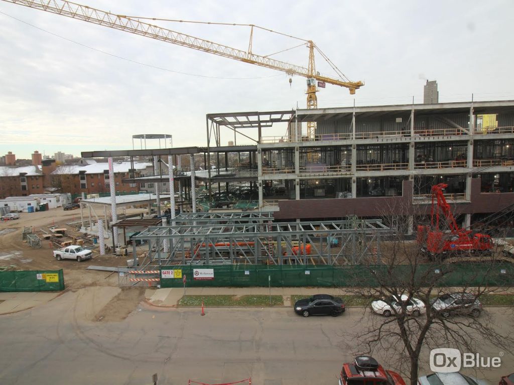 The Hagfors Center construction site Sunday, November 20, showing the structural steel framework for the skyway and the precast brick exterior installed on the east side of the building.