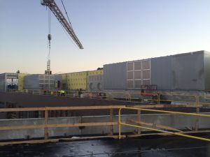 Heating, ventilation and air conditioning units are in place in rooftop mechanical are on the fourth floor. Crews are beginning to construct the structure that will cover the area. 