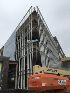 The final framing of the exterior curtainwall, on the "prow" of the lobby area, is underway this week.