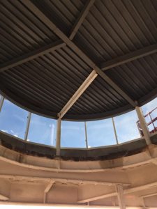 The signed beam is visible (for now) in the ceiling of the chapel. Glass installation on the cupola of the chapel is complete.