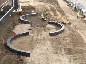 Exterior semi-circle concrete benches.