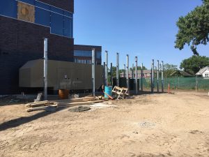 Posts for the electrical yard screenwall is in progress