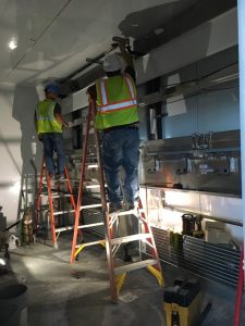 Installation of environmental control equipment in the grow rooms.