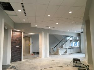 Ceiling and floor under construction in second-level lobby area