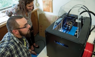 [L to R]: Lewis Istok ’18 and Abigale Enrici ’18 create a two-material print using a 3-D printer purchased with Give to the Max Day funds. 