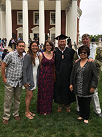 Lewis Nelson with family at graduation