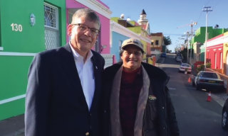 Augsburg University President Paul Pribbenow stands with Cape Town with guide Shireen Narkedien while in Namibia