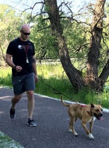 Brandon Running with Dog