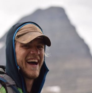 Baird Link smiling in front of a mountain